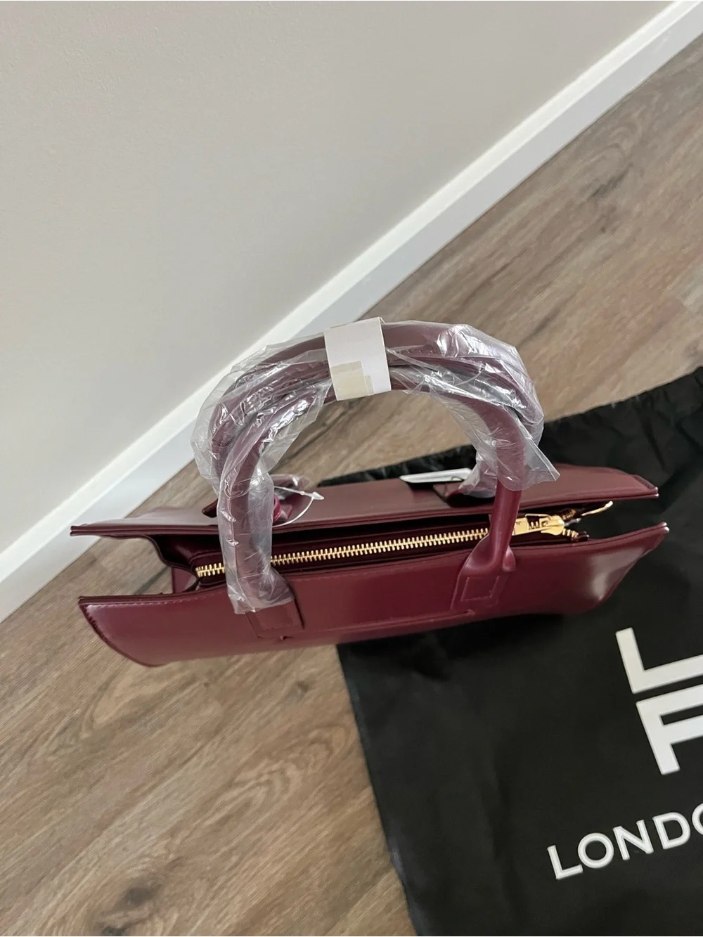 Brand New London Fog Oxblood Color Handbag/satchel style.